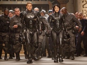Charlie Hunnam and Rinko Kikuchi battle to save the earth -- and summertime cinema -- in 'Pacific Rim'.